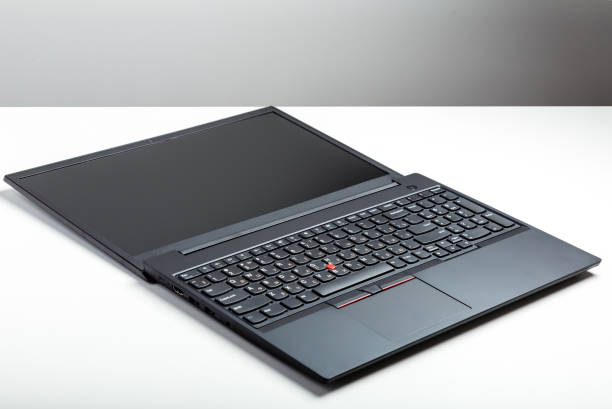 istock Convertible laptop open. Laptop screen template for website digital design Empty open laptop with mockup on white desk table with black screen. minimalist work space with modern Convertible notebook. 1369912942