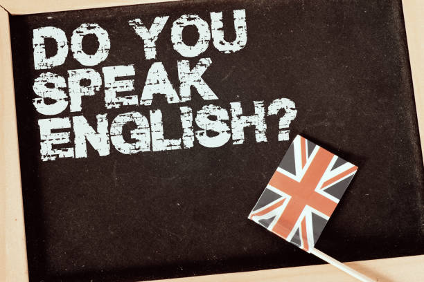 istock Flag of Great Britain and Question Speak English 1369913971
