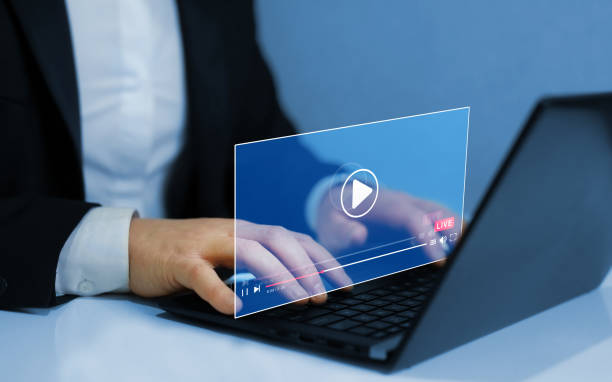 istock Woman watching a 
live stream. Online live stream window. Video streaming on internet concept. Live digital stream multimedia player 1369915478