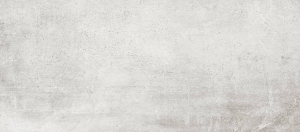 istock Natural stone texture banner. Gray marble, matt surface, granite, ivory texture, ceramic wall and floor tiles. Rustic Natural porcelain stoneware background high resolution. Limestone pattern 1369919611