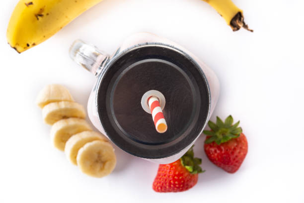 istock Fresh strawberry and banana smoothie in jar 1369920877