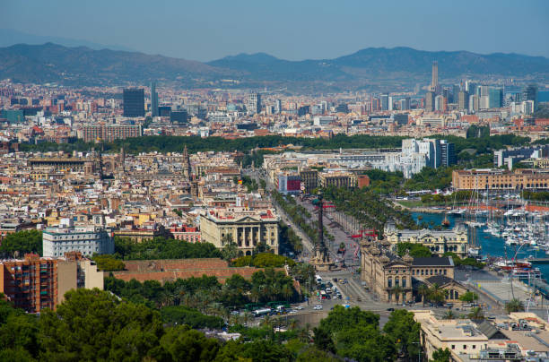 istock Panoramic view over Passeig de Colom, La Barceloneta, Port Vell marina, Christopher Columbus monument in Barcelona city, Catalonia, Spain 1369921992
