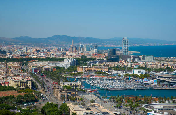 Panoramic view over Passeig de Colom, La Barceloneta, Port Vell marina, Christopher Columbus monument in Barcelona city, Catalonia, Spain Panoramic view over Passeig de Colom, La Barceloneta, Port Vell marina, Christopher Columbus monument in Barcelona city, Catalonia, Spain columbus avenue stock pictures, royalty-free photos & images