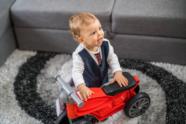 istock Baby boy with his first bike 1369923521