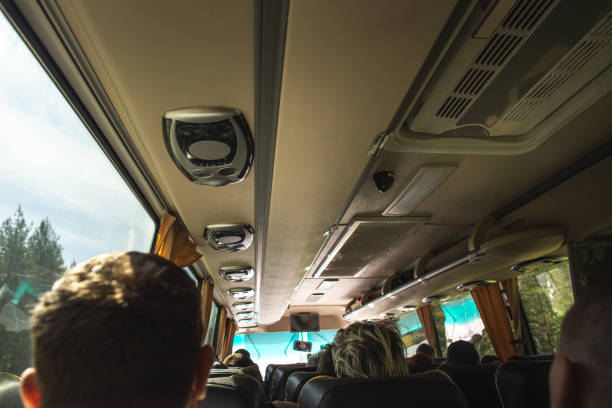 Row of air conditioning system in shuttle bus, making cool fresh air all inside the bus, soft focus stock photo