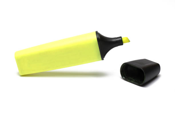 istock Closeup yellow textmarker highlighter highlighting white background 1369927667