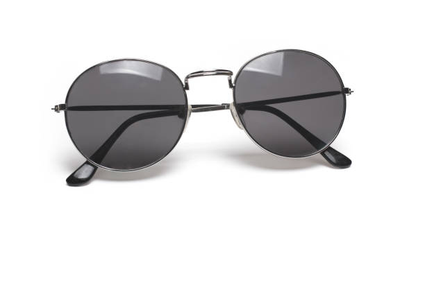 istock closeup sunglasses metal dark lenses white background 1369927740