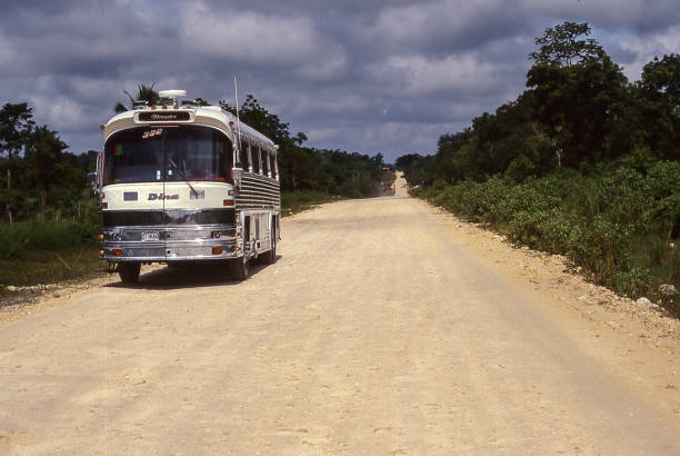 Guatemala - aug 12, 1988: an old coach is stopped on the edge of Carettera 13, an important connection route but still not asphalted