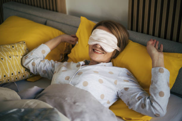 istock Senior woman in bed. 1369929668