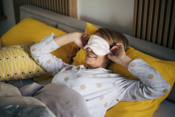 istock Senior woman in bed. 1369929714