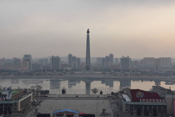 The Juche Tower and Taedong River, Pyongyang stock photo