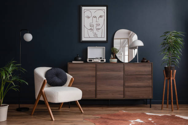 modern living room interior composition with fluffy armchair, wooden commode, mock up poster frame, vinyl recorder and modern home accessories. blue wall. template. copy space. - sideboard imagens e fotografias de stock