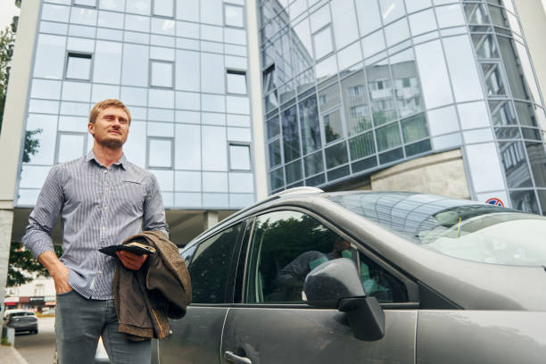 istock Man having a walk outdoors in the city at daytime 1369939409