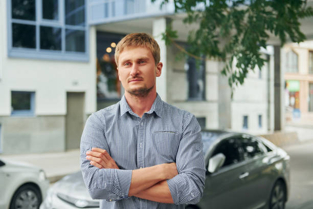 istock Man having a walk outdoors in the city at daytime 1369939983