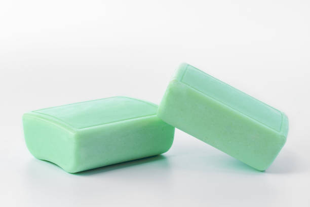 istock Green soap bars isolated on white background. 1369940752