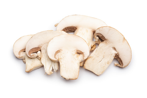 Cutting mushrooms isolated on white