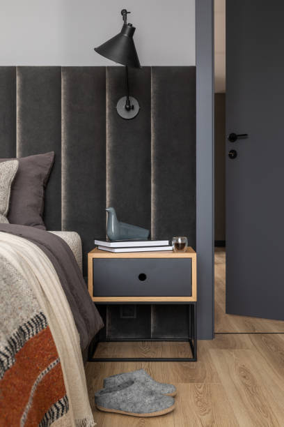 istock Creative composition of bedroom minimalistic interior details. Side table, design lamp, bedroom textiles and elegant accessories. Template. Design. home decor. 1369945720