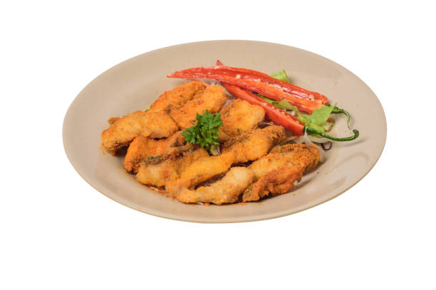 istock Crispy fried fish fillet sprinkled with cheese 1369945752