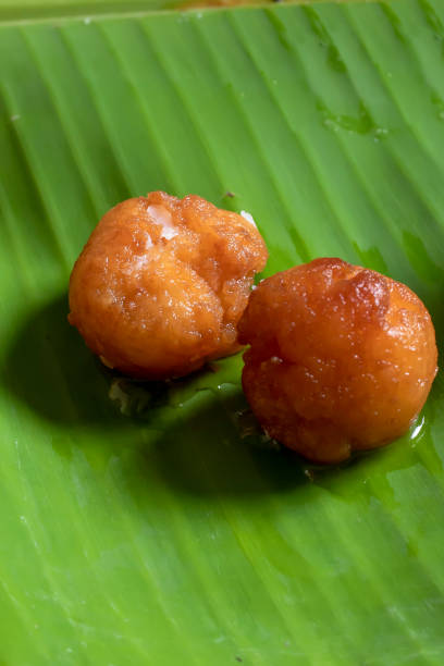 istock Gulab Jamun in banana leaf. Indian Sweet Dish 1369949447