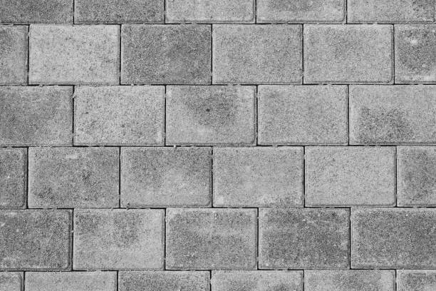 istock Street tile texture background. A pattern of gray paving slabs. 1369950987