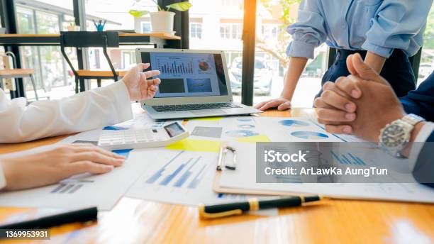 Meeting With Business People To Discuss And Brainstorm Ideas On Financial Reports The Concept Of Working As A Team Of Financial Advisors And Accounting Investments With A Team At The Office Stock Photo - Download Image Now