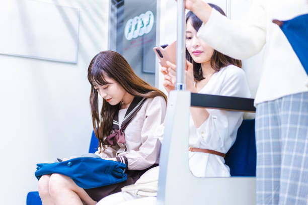 istock A high school girl commuting to school by train 1369957093