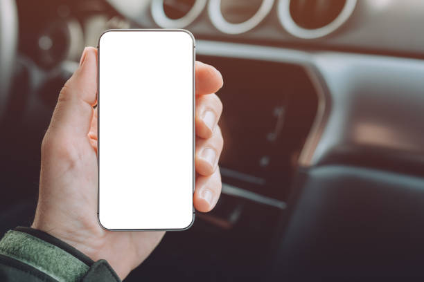 istock Mobile smart phone device in male hand, mock up with blank white screen 1369957535