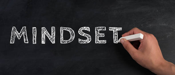 istock The word mindest is standing on a chalk board, coaching concept, changing believes, starting a new business, positive thinking 1369965941
