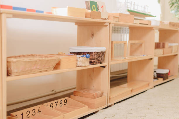 istock wooden shelf with materials for Montessori studies. study of chickens, mathematics. 1369966025
