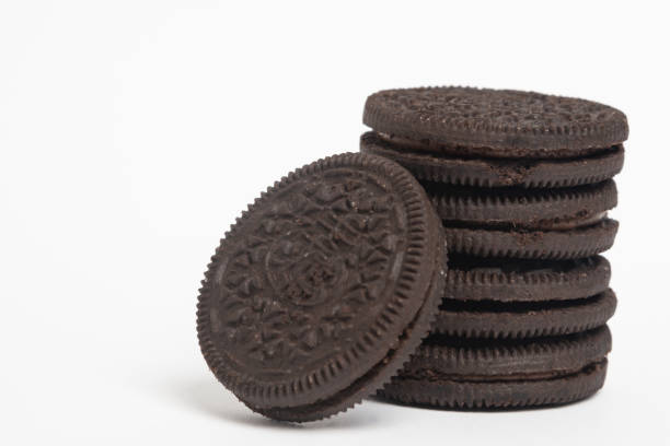 istock soft dark chocolate brownie cookies on white background. 1369966150