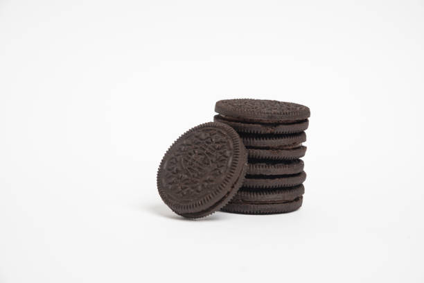 istock soft dark chocolate brownie cookies on white background. 1369966152