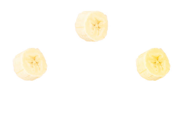 cropped banana slices isolated on white background