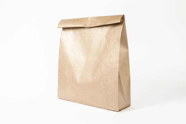 istock paper hand bag on white background 1369971286