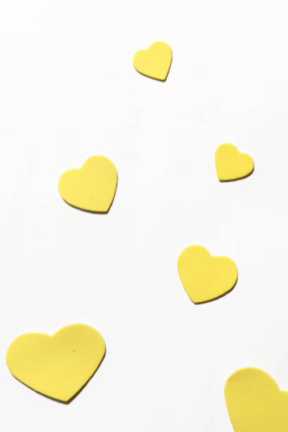 istock Yellow hearts with white background 1369972724