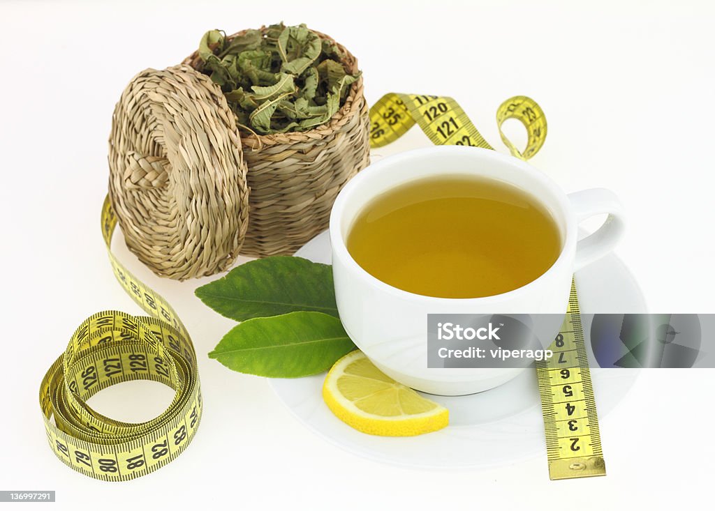 Cup of verbena Cup of lemon verbena and measuring tape Tea - Hot Drink Stock Photo