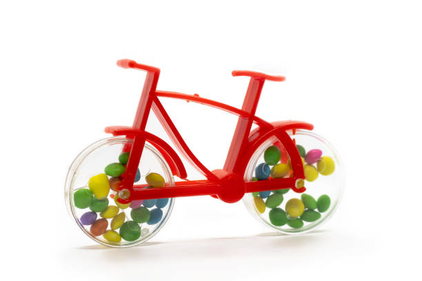 Isolated plastic toy bicycle in white background