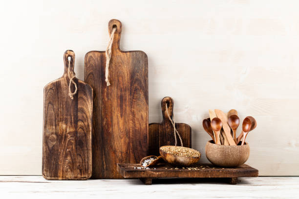 istock Interior design of gray kitchen wall with copper equipment and chopping board 1369973455