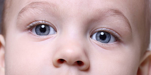 istock look of nice baby close up 136997346