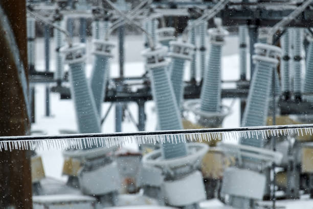Electrical Substation in Ice Storm High voltage electrical substation during an intense ice storm & subsequent power outage. electricity substation photos stock pictures, royalty-free photos & images