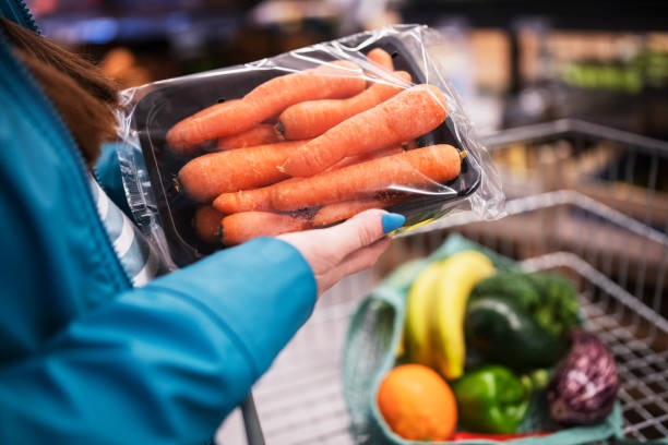 istock Shopping in vegetable aisle. 1369976741