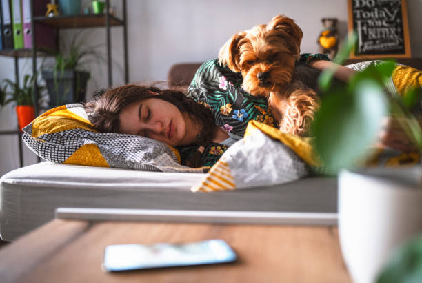 istock Woman in bed on sunrise. 1369976764