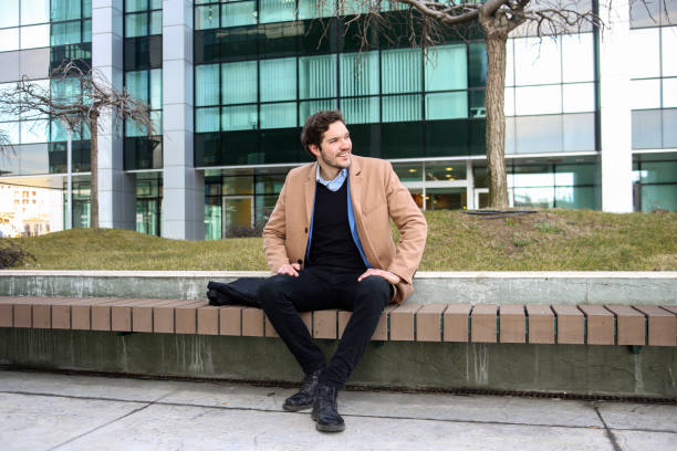 istock Businessman sitting on a bench 1369979288