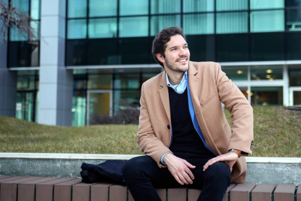 istock Businessman sitting on a bench 1369979292