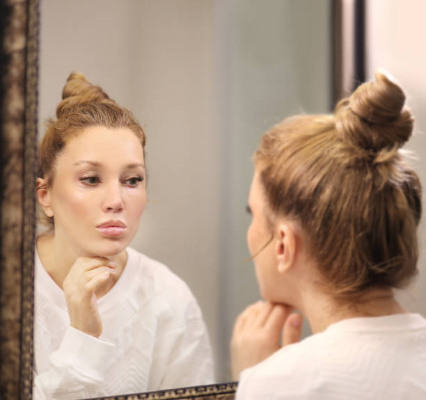 istock Applying the cream.Magic anti-aging cream. 1369979373