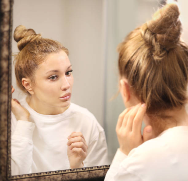 istock Applying the cream.Magic anti-aging cream. 1369979377