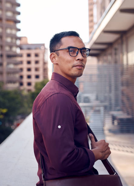 istock Shot of a young businessman taking a break from work 1369981355