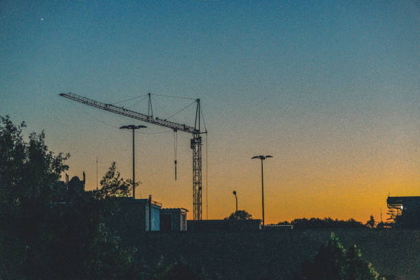 istock View of a construction site in the setting sun. 1369983935