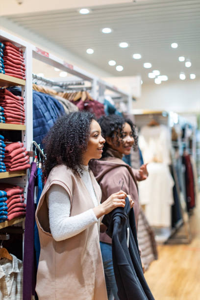 istock Two African women in shopping mall 1369985920