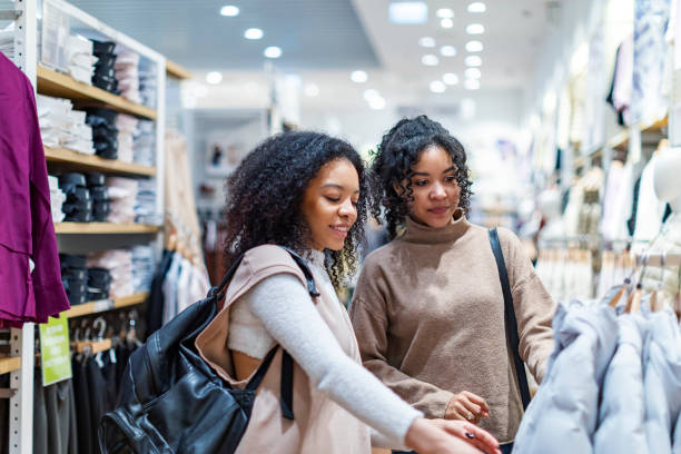 istock Two African women in shopping mall 1369986253