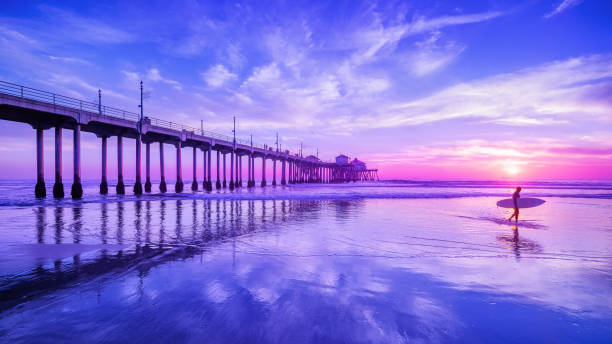 california the huntington beach pier during sunset, california huntington beach california stock pictures, royalty-free photos & images